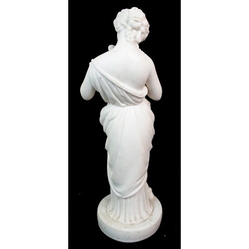 628 - A PARIAN FIGURE OF A WOMAN HOLDING A TAMBOURINE