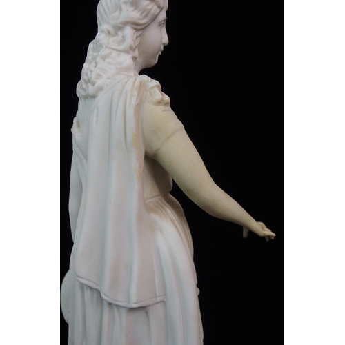 631 - A PARIAN CENTREPIECE MODELLED AS A STANDING WOMAN