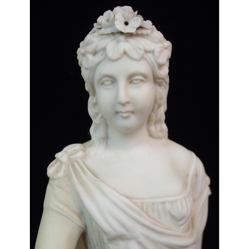 631 - A PARIAN CENTREPIECE MODELLED AS A STANDING WOMAN