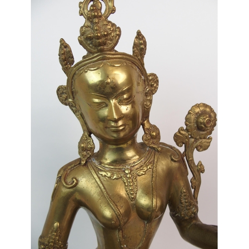 65 - A LARGE BRASS BODHISATTVA