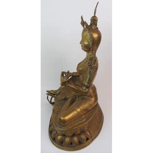 65 - A LARGE BRASS BODHISATTVA