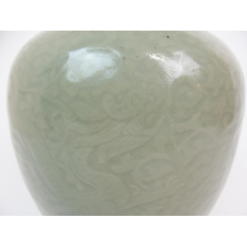 67 - A CHINESE CELADON BALUSTER VASE