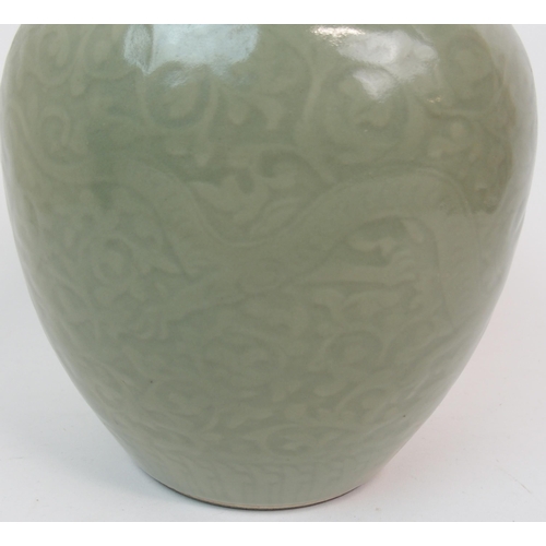 67 - A CHINESE CELADON BALUSTER VASE