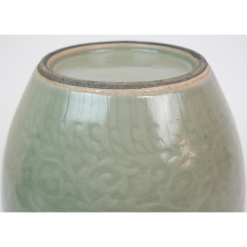 67 - A CHINESE CELADON BALUSTER VASE