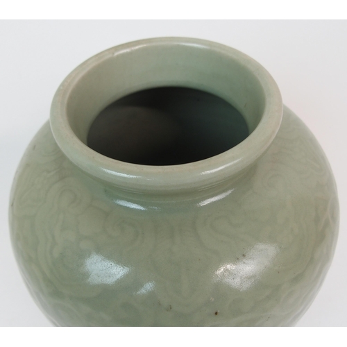 67 - A CHINESE CELADON BALUSTER VASE