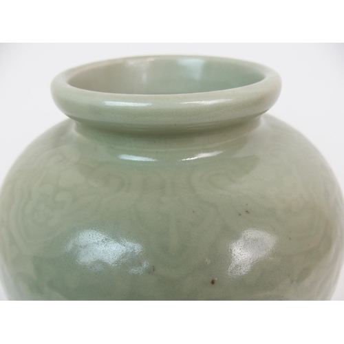 67 - A CHINESE CELADON BALUSTER VASE