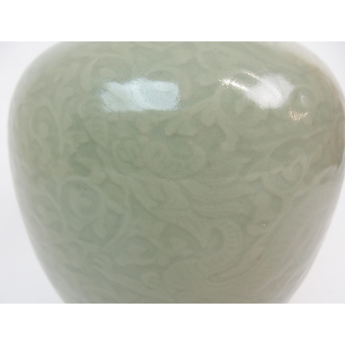 67 - A CHINESE CELADON BALUSTER VASE