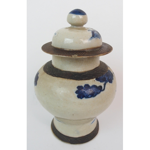 77 - A CHINESE BLUE AND WHITE JAR AND COVER