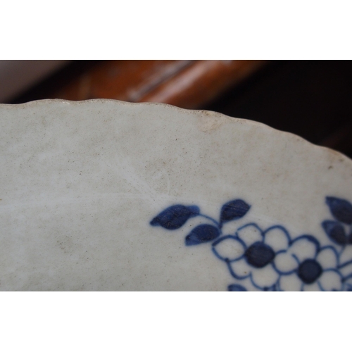 77 - A CHINESE BLUE AND WHITE JAR AND COVER