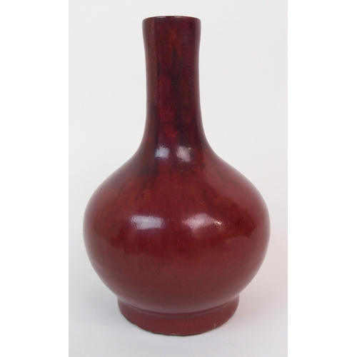 84 - A CHINESE SANG DE BOEUF BALUSTER VASE