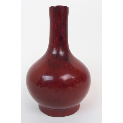 84 - A CHINESE SANG DE BOEUF BALUSTER VASE