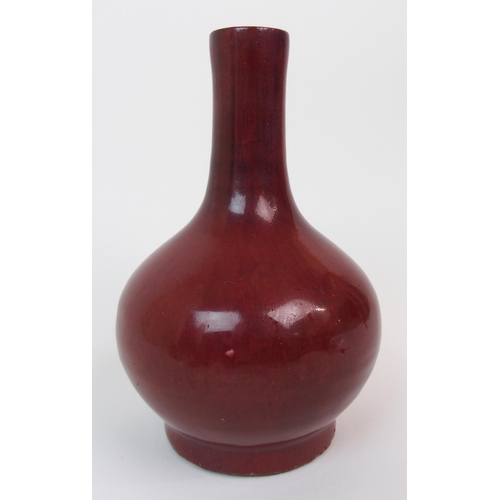 84 - A CHINESE SANG DE BOEUF BALUSTER VASE