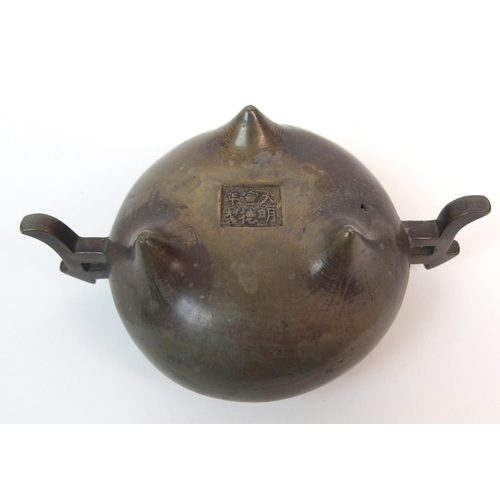 86 - A CHINESE BRONZE TWO-HANDLED CENSER AND HARDWOOD COVER