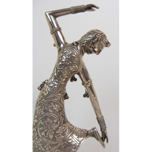 97 - AN INDIAN SILVER DANCING FIGURE OF A YOUNG WOMAN