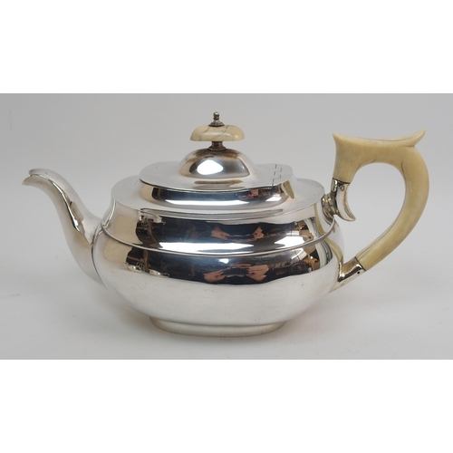 153 - A three piece silver tea service