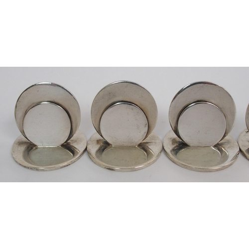 169 - A set of six silver menu holders