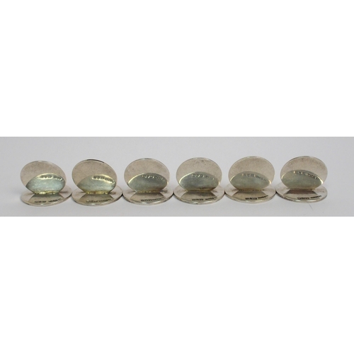 169 - A set of six silver menu holders