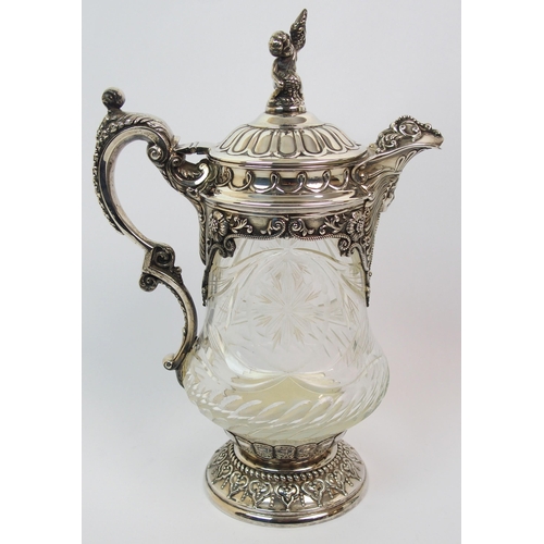 171 - A silver plate mounted cut glass claret jug