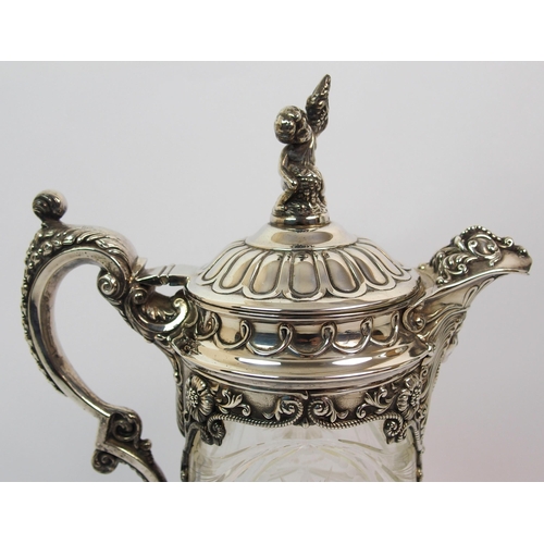 171 - A silver plate mounted cut glass claret jug