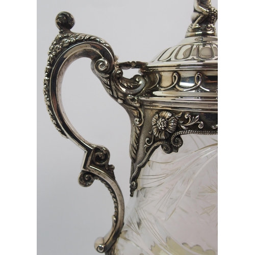 171 - A silver plate mounted cut glass claret jug