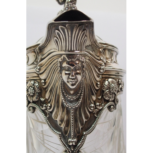 171 - A silver plate mounted cut glass claret jug