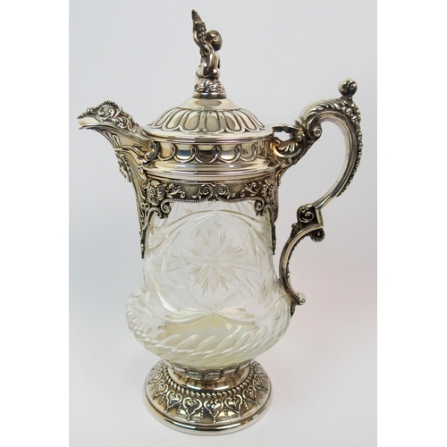 171 - A silver plate mounted cut glass claret jug