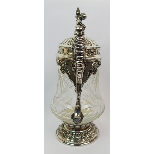 171 - A silver plate mounted cut glass claret jug