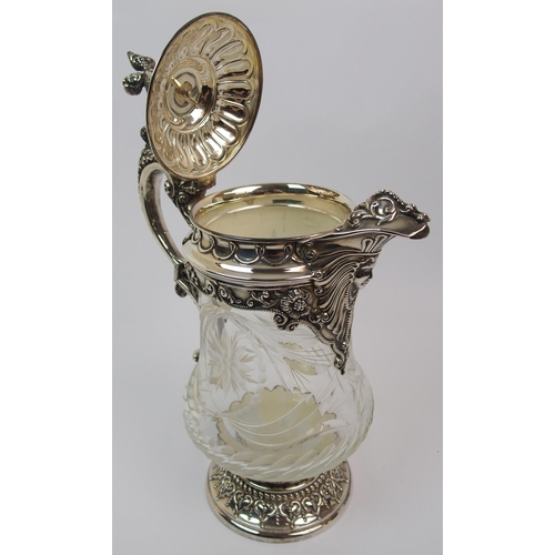 171 - A silver plate mounted cut glass claret jug