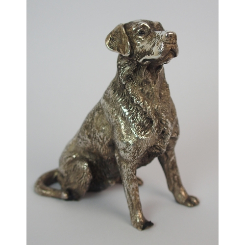 176 - A cast silver model of a Labrador dog