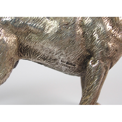 176 - A cast silver model of a Labrador dog