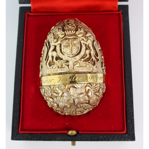 180 - A silver gilt surprise egg