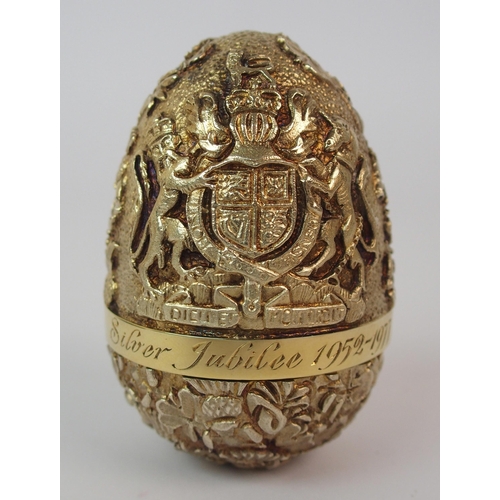 180 - A silver gilt surprise egg