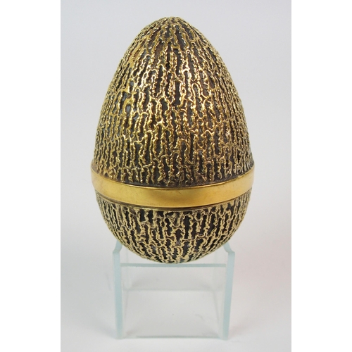 182 - A silver gilt surprise egg