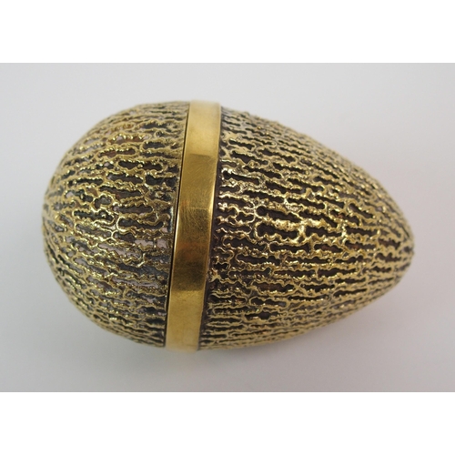 182 - A silver gilt surprise egg