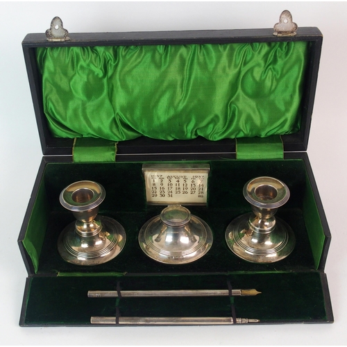 185 - An Edwardian cased silver desk set