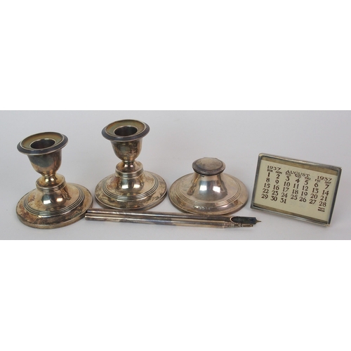 185 - An Edwardian cased silver desk set