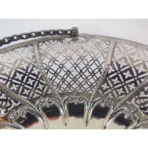 202 - A George III silver swing handled basket