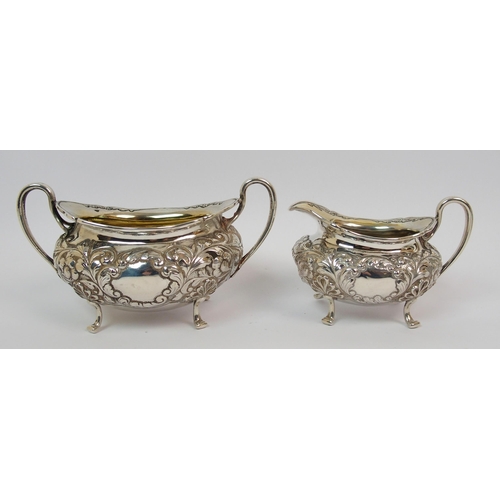 203 - An Edwardian three piece silver tea service