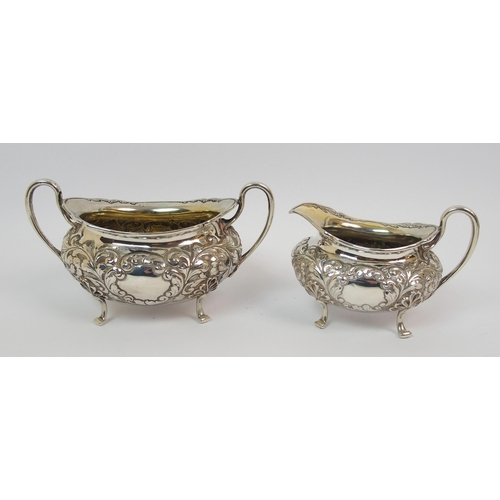 203 - An Edwardian three piece silver tea service