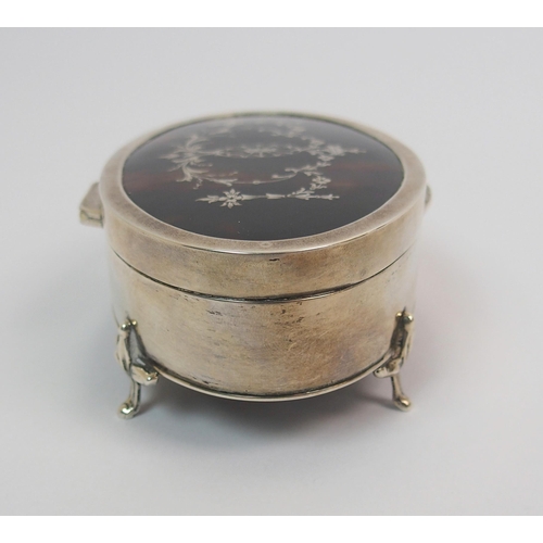 204 - An oval silver and tortoiseshell trinket box