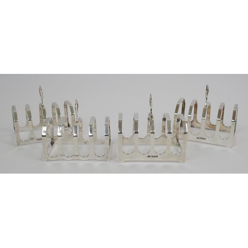 205 - A pair of silver toast racks