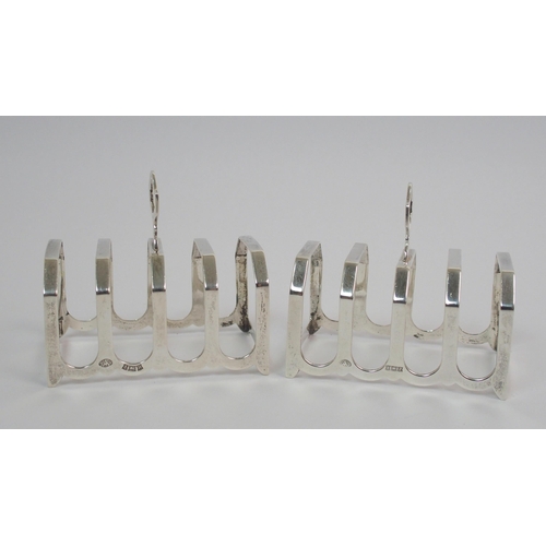 205 - A pair of silver toast racks