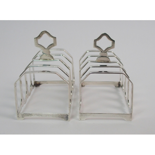 205 - A pair of silver toast racks