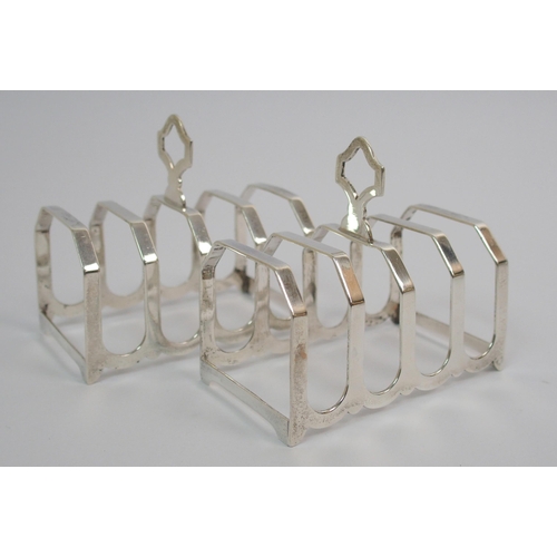 205 - A pair of silver toast racks