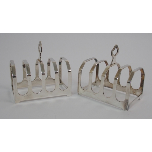 205 - A pair of silver toast racks