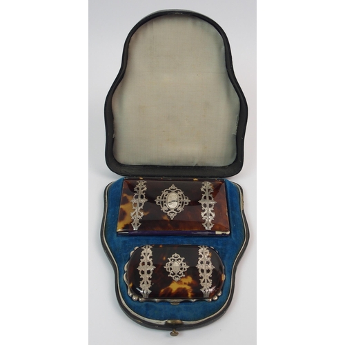 209 - A Victorian cased tortoise shell and white-metal mounted card case/aide memoir and similar coin purs... 