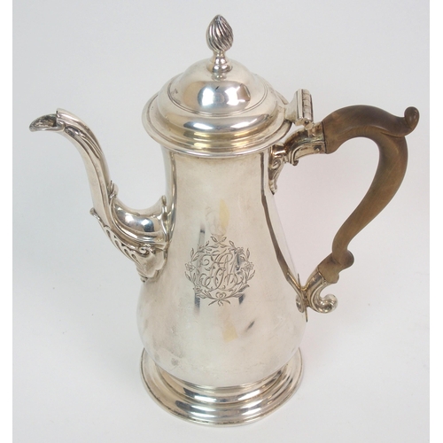 210 - An 18th Century silver coffee pot