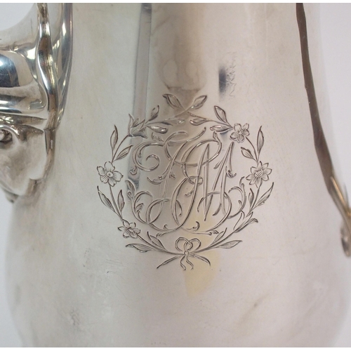 210 - An 18th Century silver coffee pot