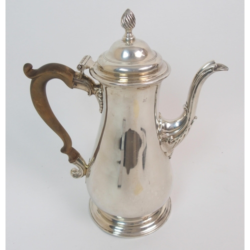 210 - An 18th Century silver coffee pot