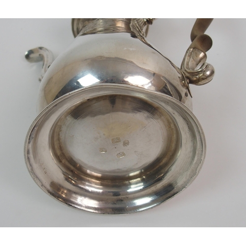 210 - An 18th Century silver coffee pot